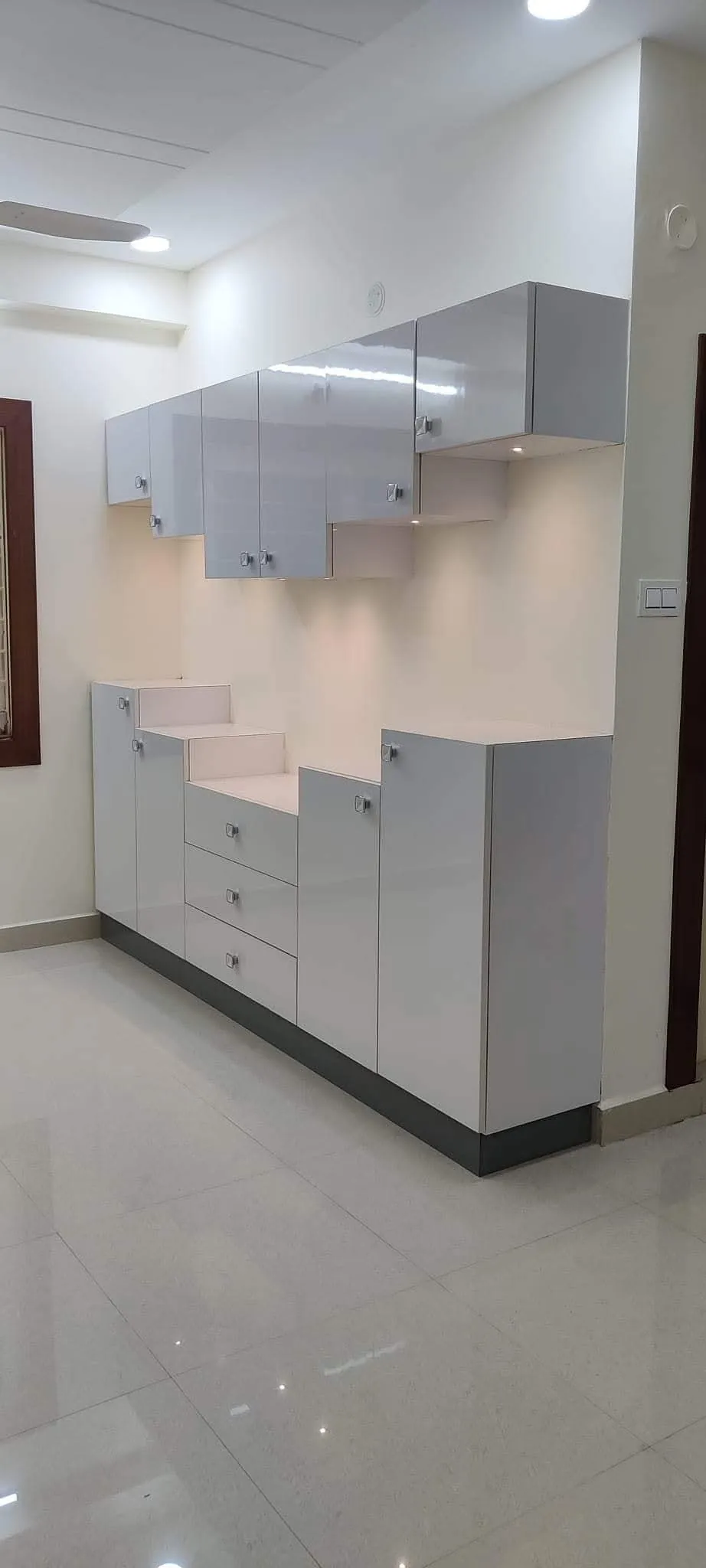 Compact white storage unit with drawers