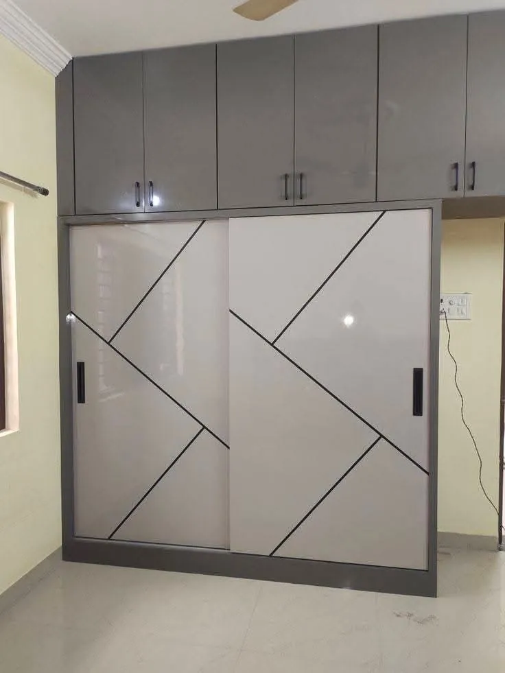 White sliding wardrobe with diagonal groove design
